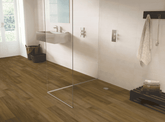 Sussex Range Smart 30 Natural luxury vinyl flooring installed in contemporary shower room showing natural wood effect